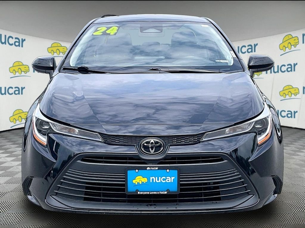 Used 2024 Black Toyota LE image 2