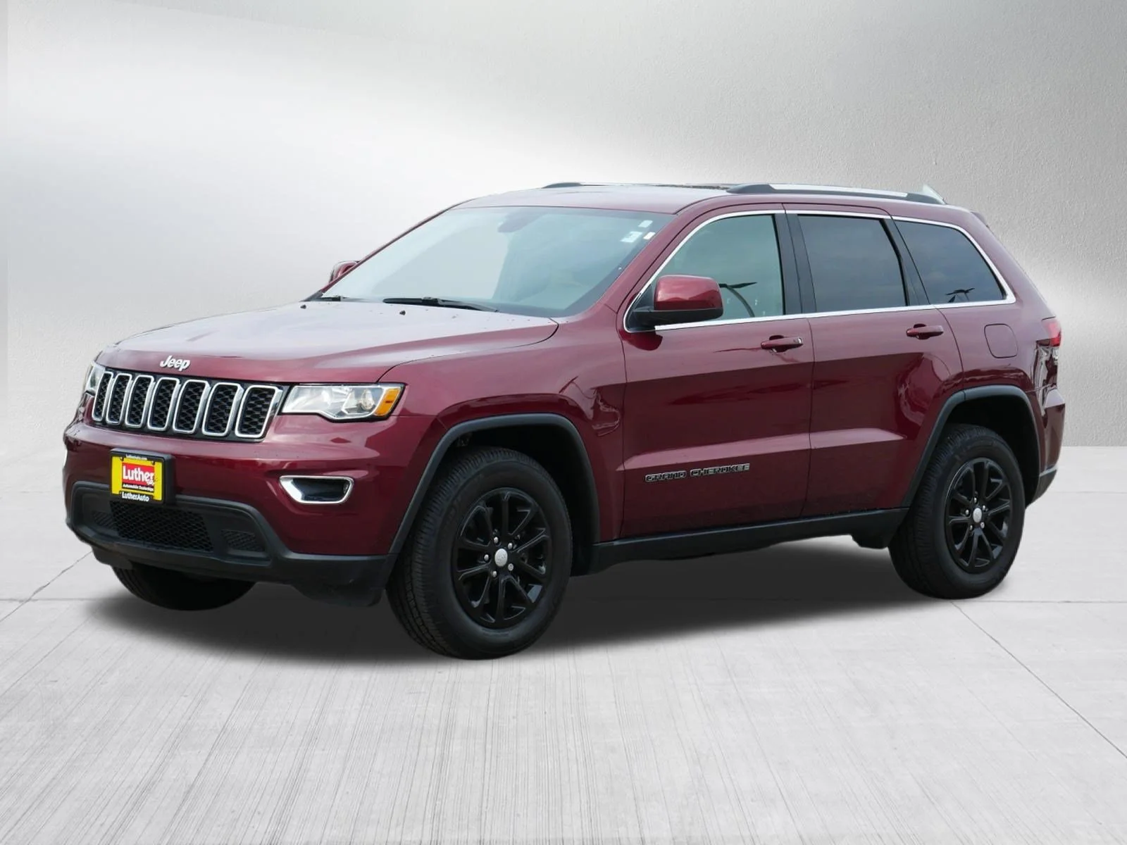 Used 2021 Velvet Red Pearlcoat Jeep Laredo E image 3