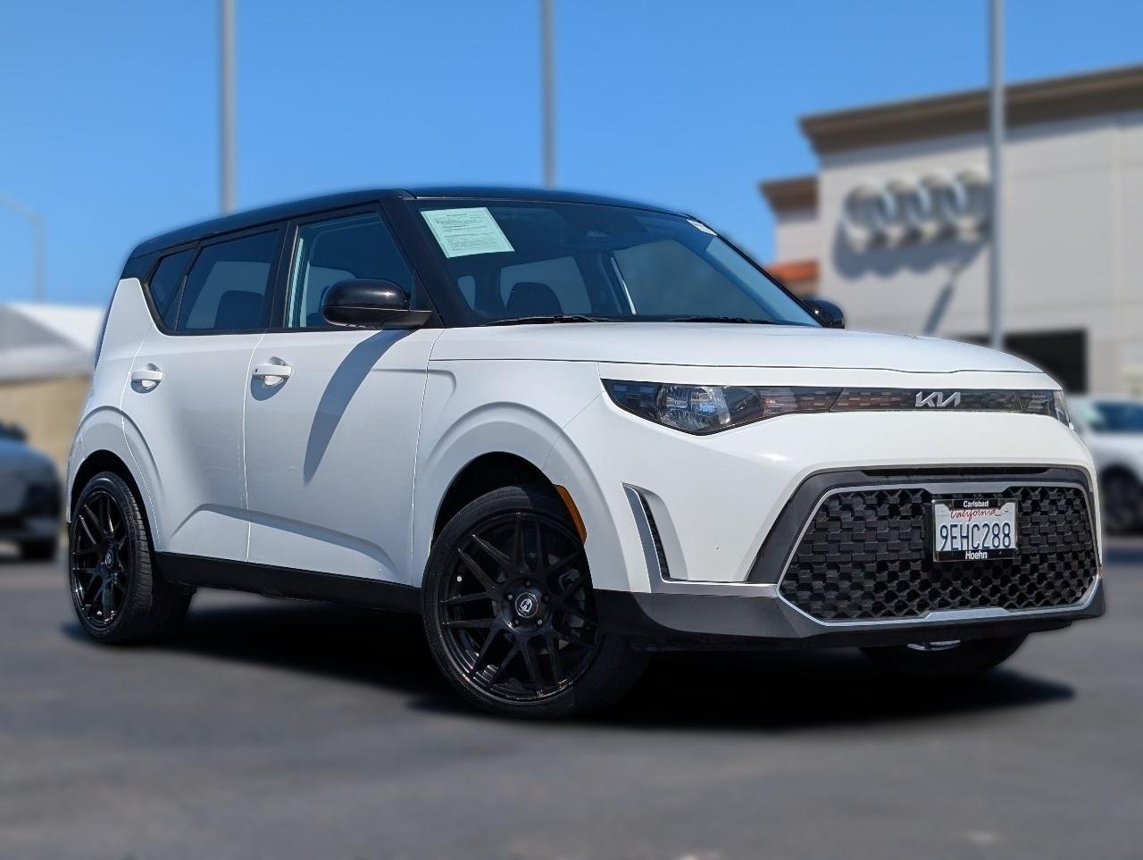 Used 2023 Clear White w/Black Roof Kia S image 1