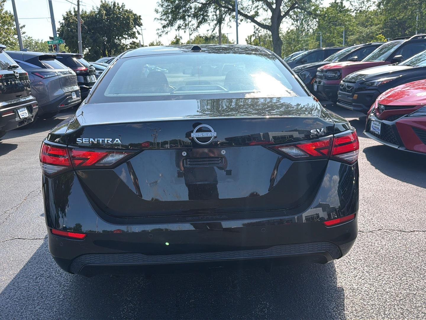 Used 2024 Super Black Nissan SV image 5