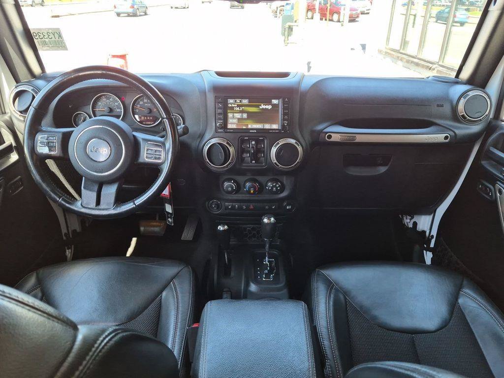 Used 2016 White Jeep Unlimited Sahara image 15