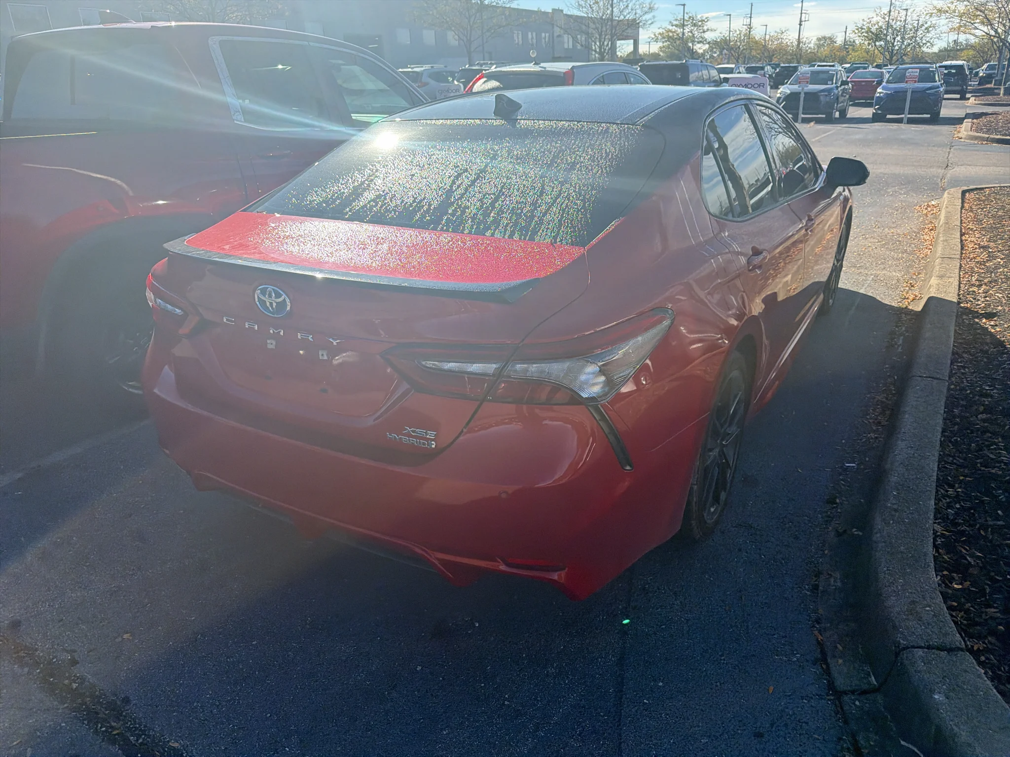 Used 2021 Supersonic Red/Midnight Black Metallic Toyota Hybrid XSE image 7