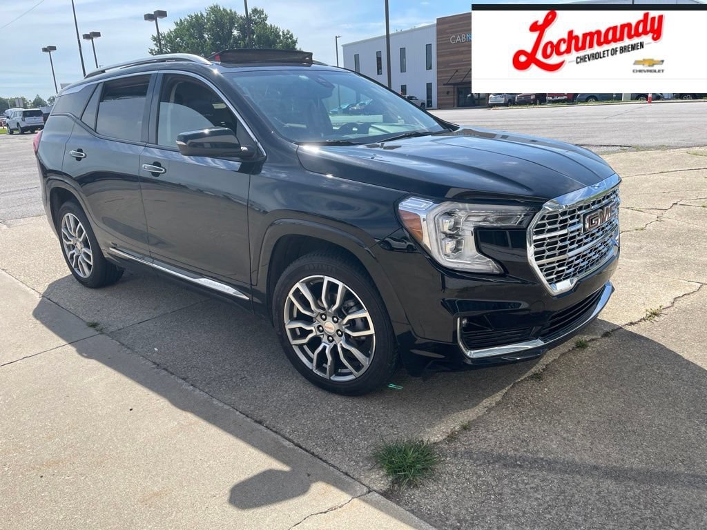 Used 2023 EBONY TWILIGHT METALLIC GMC Denali image 1
