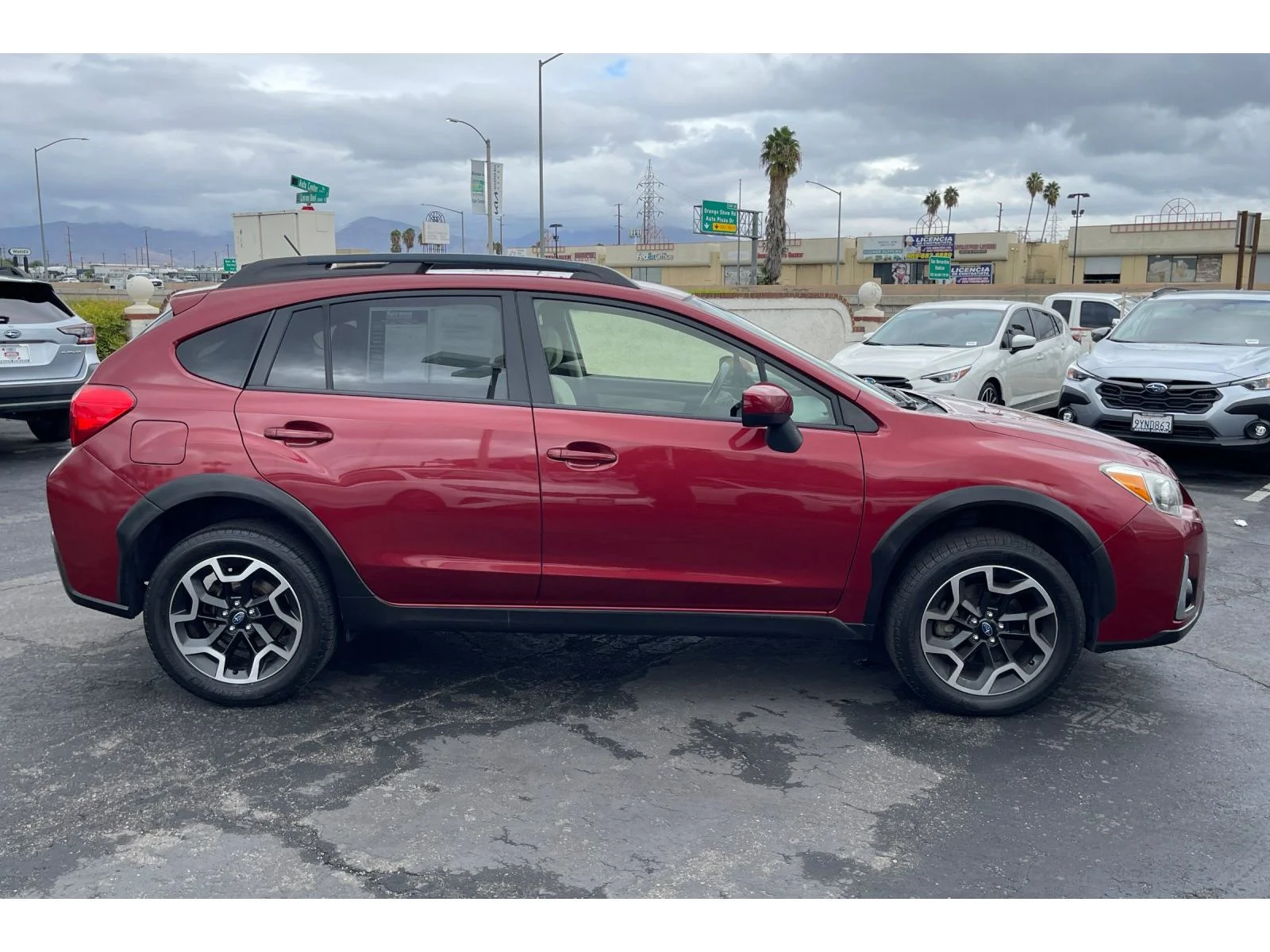Used 2017 VENETIAN RED PEAR Subaru Premium image 7