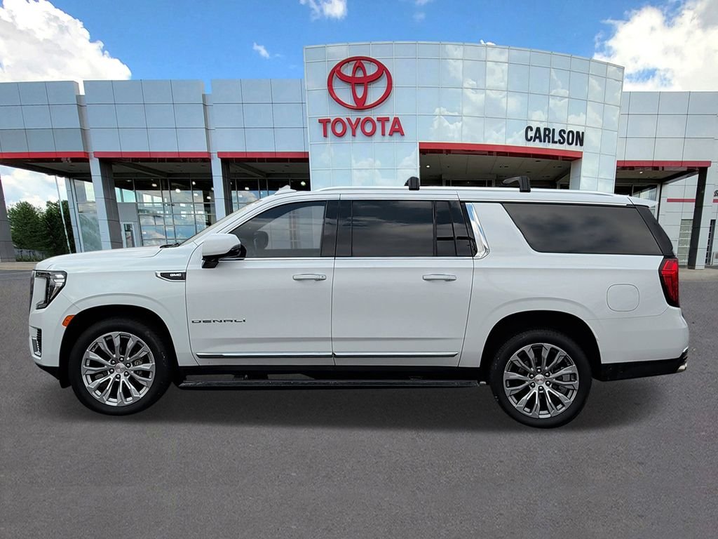 Used 2021 GMC Yukon XL Denali with VIN 1GKS2JKLXMR262291 for sale in Minneapolis, Minnesota