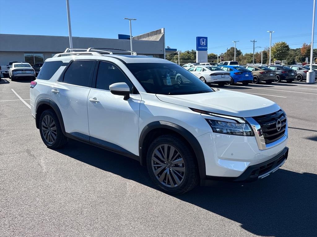Used 2024 PEARL WHITE TRICO Nissan SL image 10
