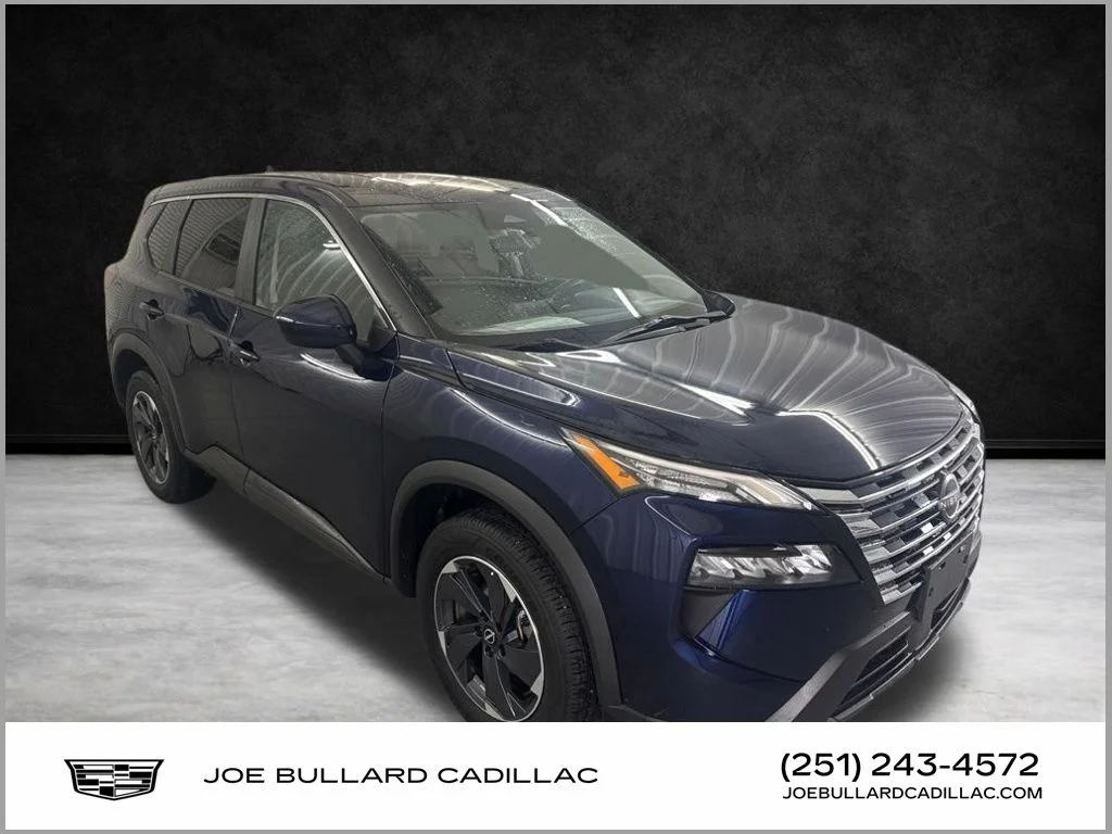 Used 2024 Deep Ocean Blue Pearl Nissan SV image 1