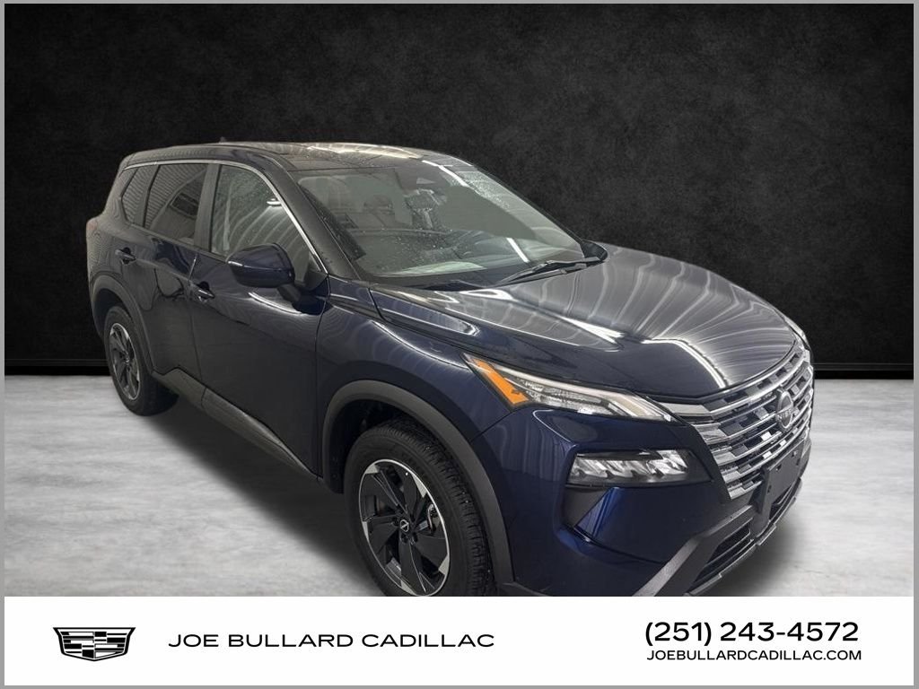 Used 2024 Deep Ocean Blue Pearl Nissan SV image 1