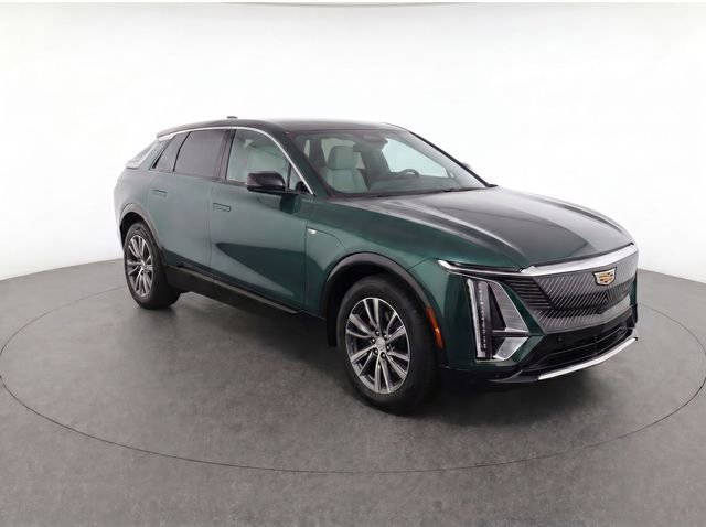 Used 2024 Emerald Lake Metallic Cadillac Sport 1 image 2