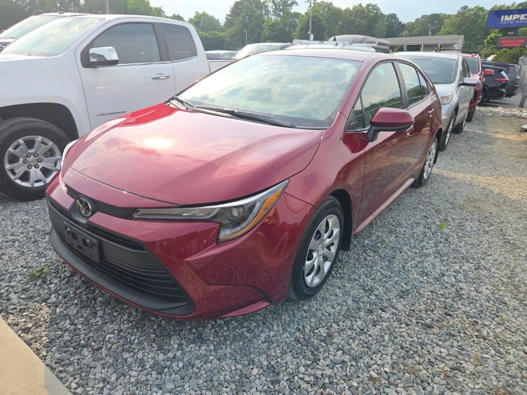Used 2026 Red Toyota LE image 1
