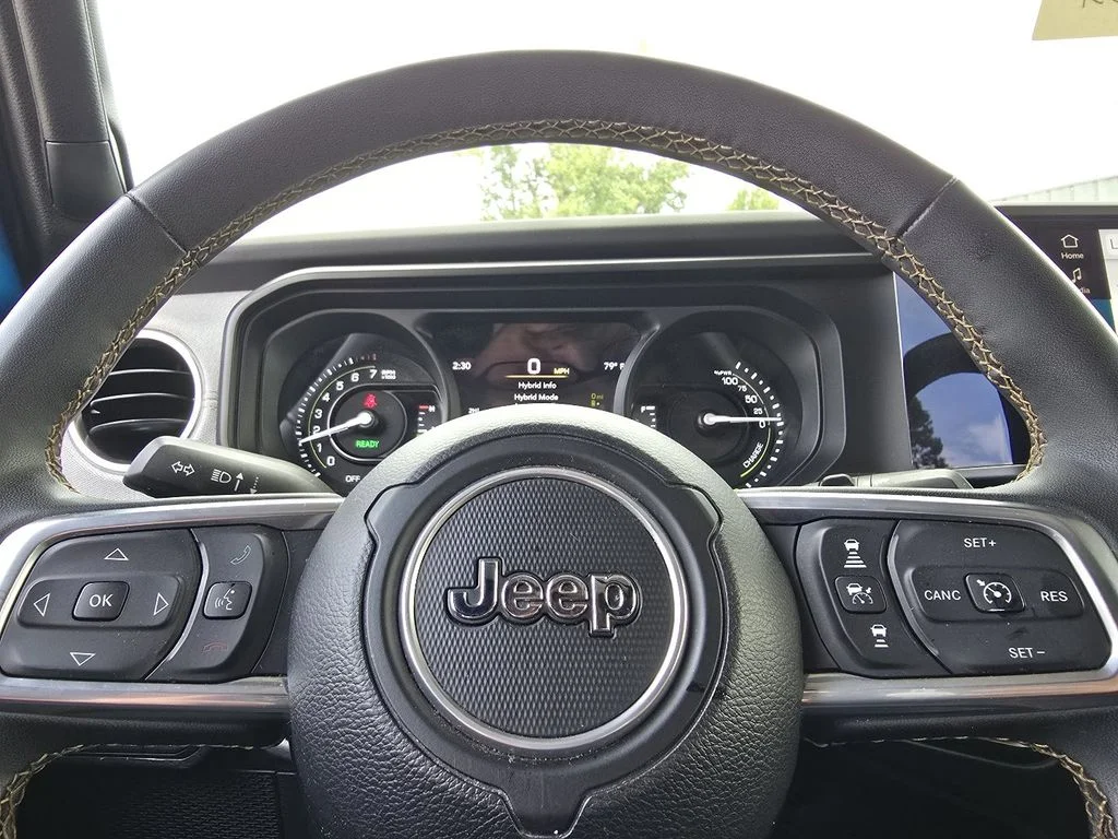 Used 2024 Blue Jeep Sahara 4xe image 25