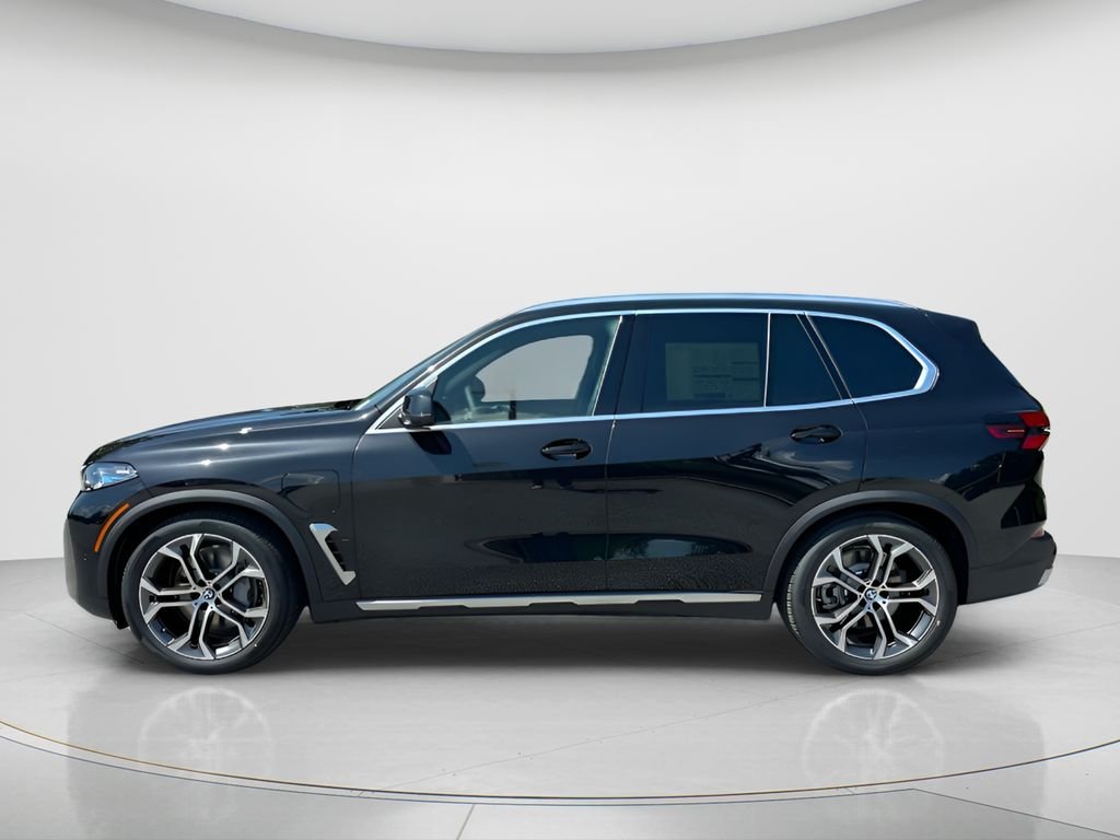 New 2026 Black Sapphire Metallic BMW xDrive50e image 7