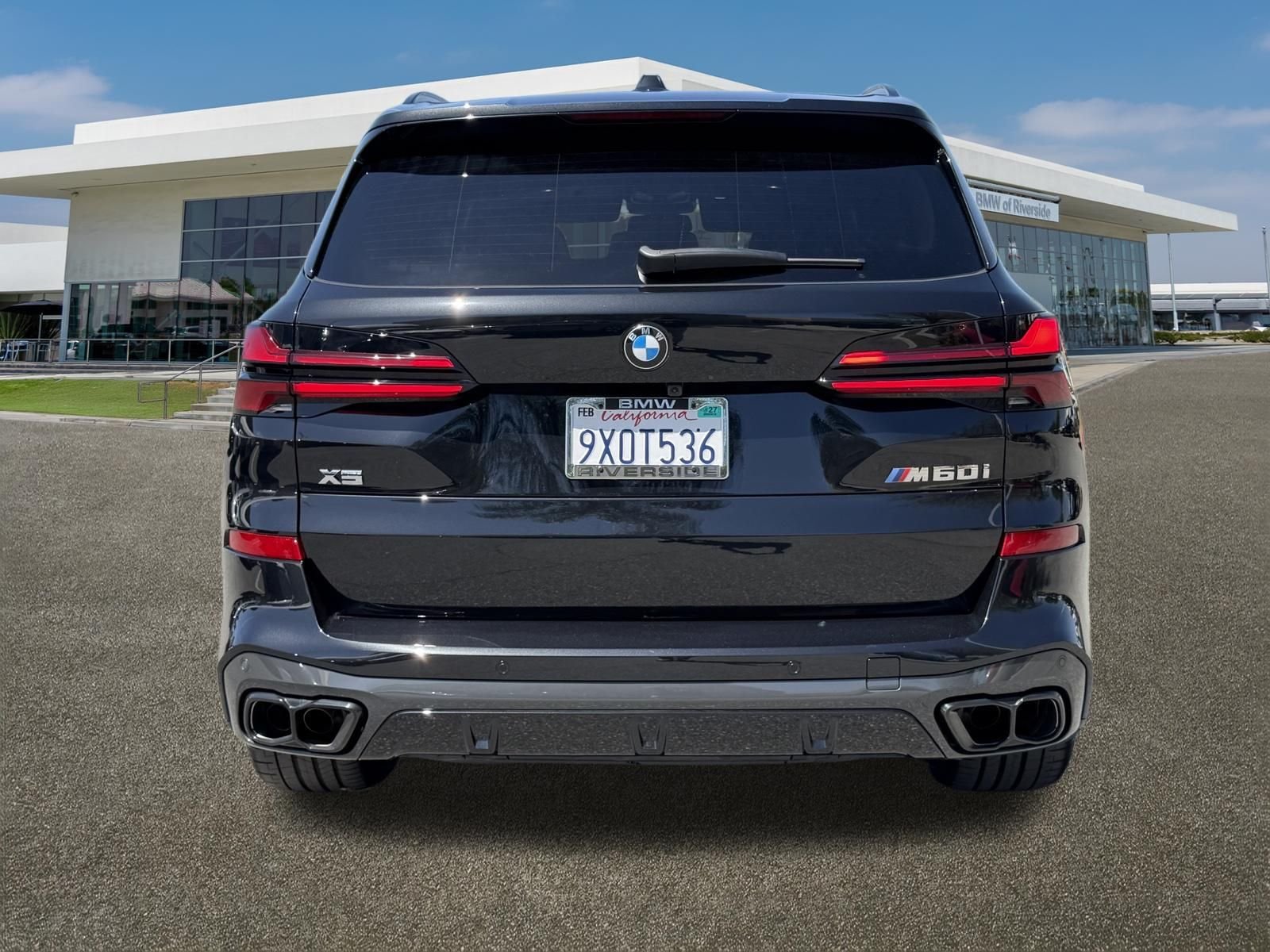 Used 2026 Black Sapphire Metallic BMW M60i image 9