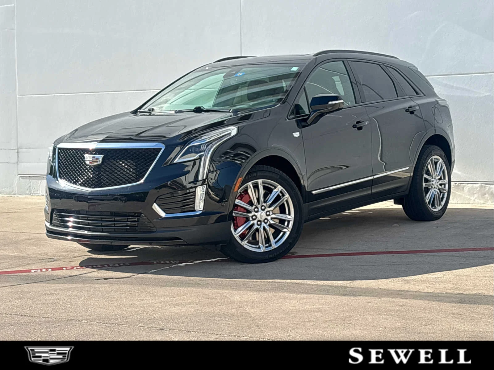 Used 2024 Stellar Black Metallic Cadillac Sport image 1