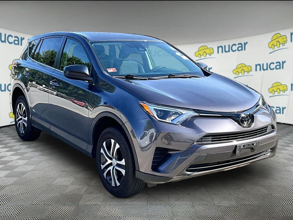 Used 2018 Gray Toyota LE image 1