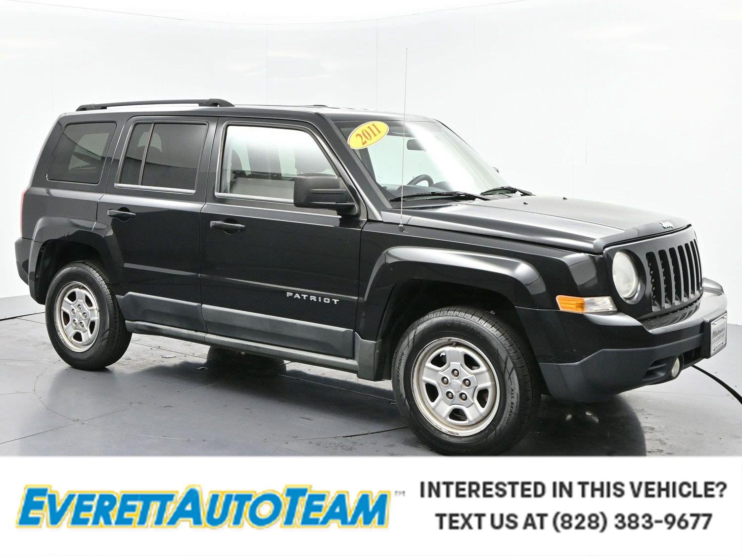 Used 2011 Brilliant Black Crystal Pearl Jeep Sport image 1