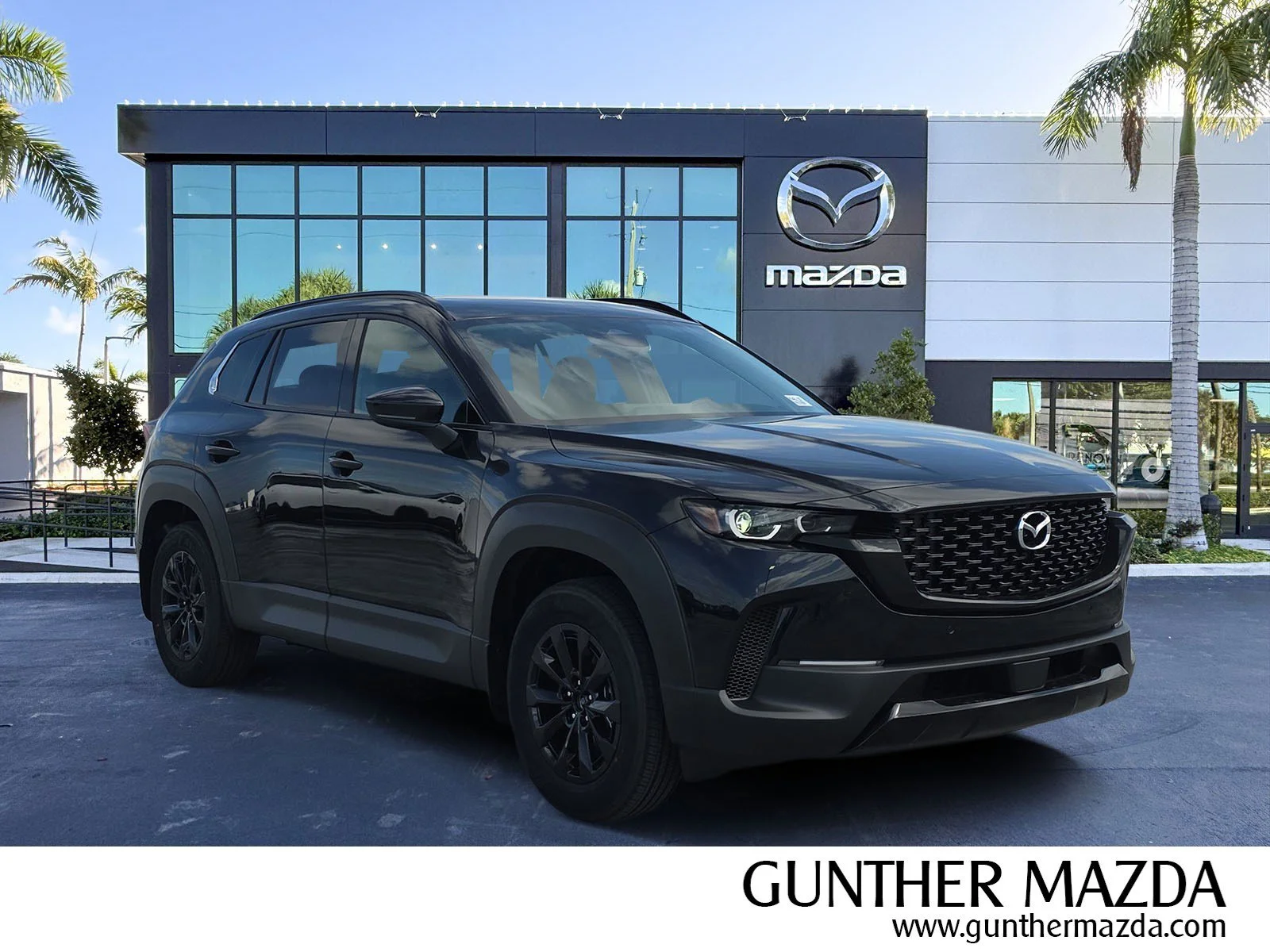 New 2026 Jet Black Mica Mazda Premium image 1