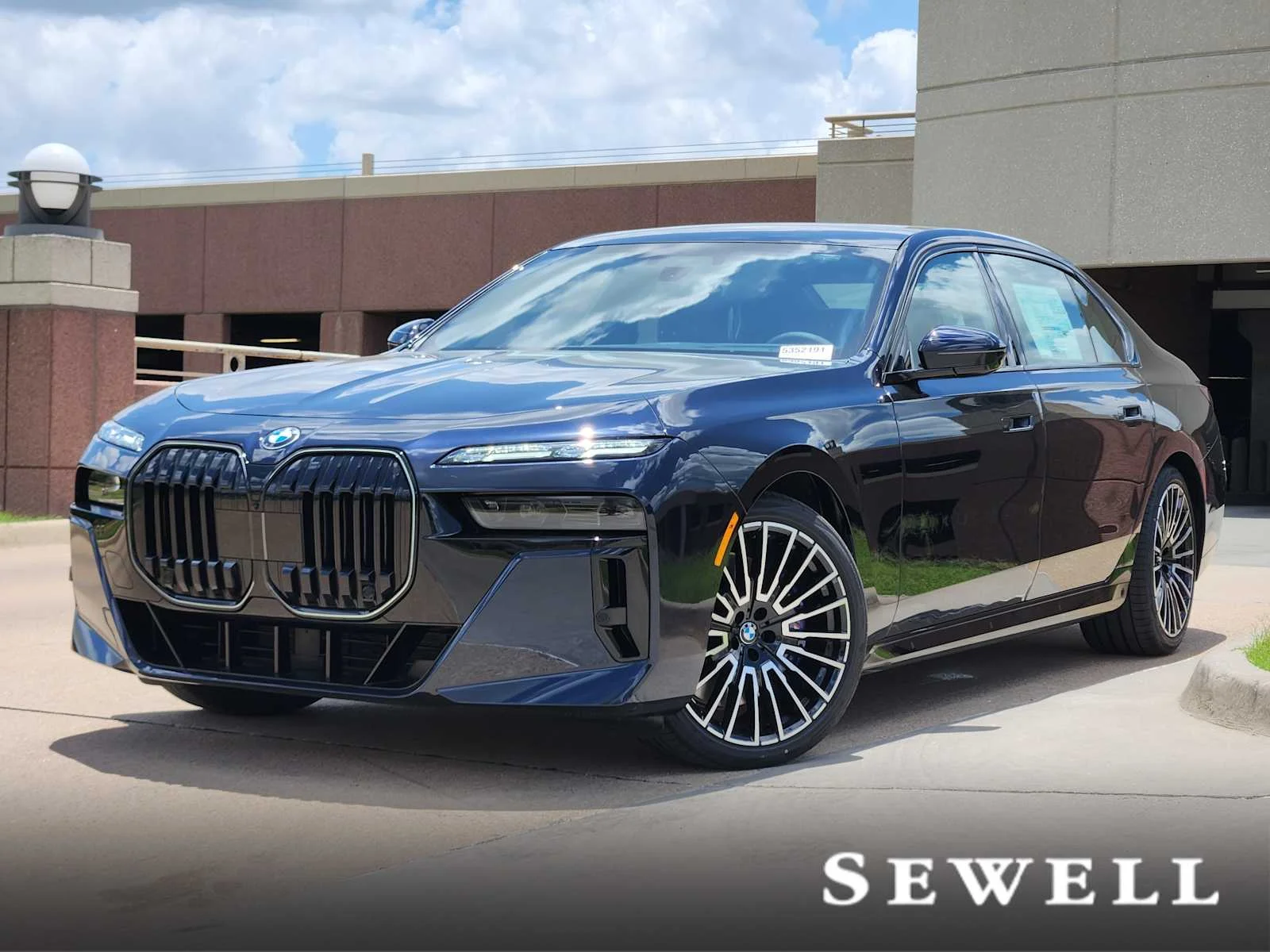 Certified Used 2025 Carbon Black Metallic BMW 760i xDrive image 1