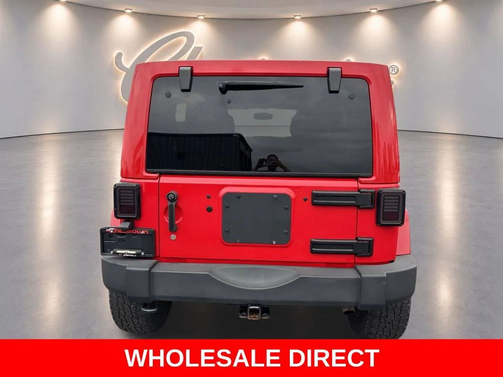 Used 2015 Red Jeep Unlimited Sport image 4