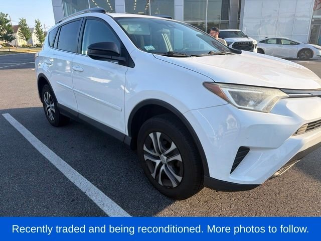Used 2018 White Toyota LE image 1