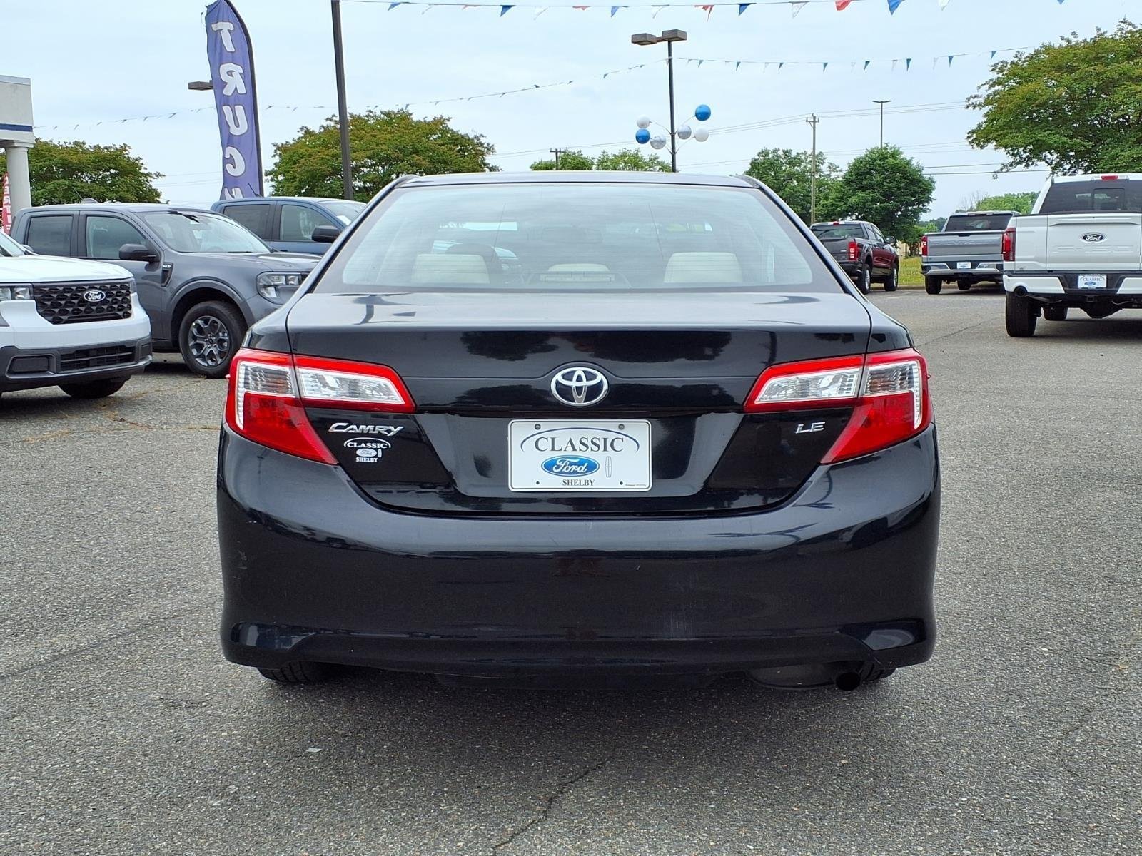 Used 2012 Attitude Black Metallic Toyota LE image 9