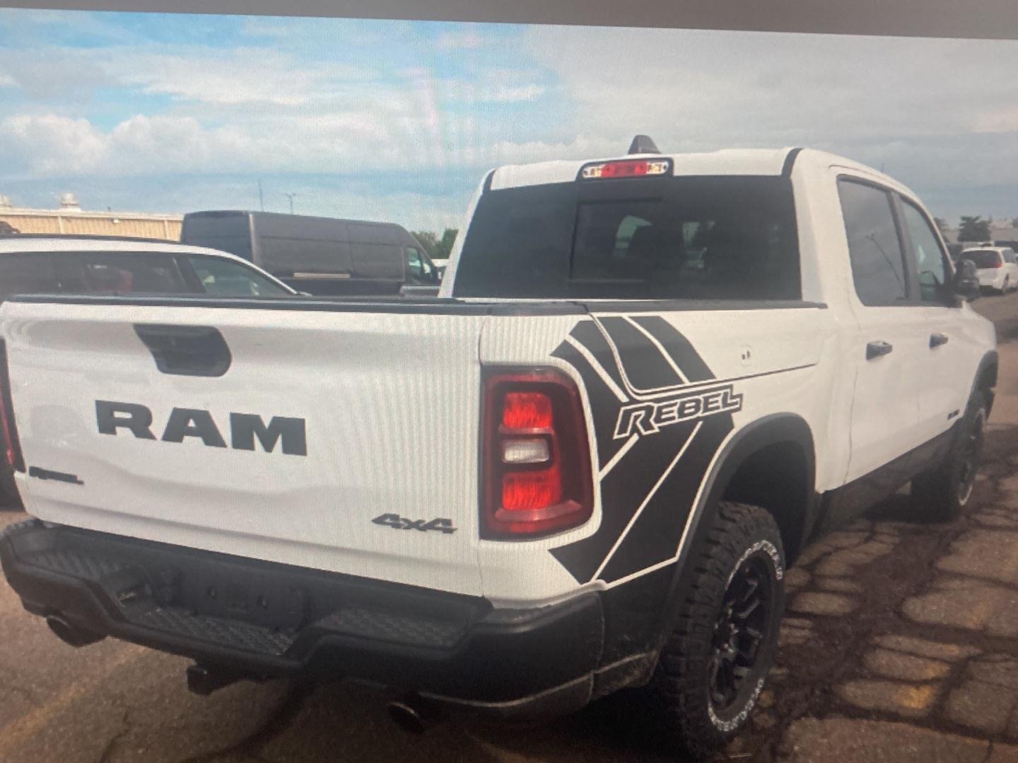 Used 2025 Bright White Clearcoat Ram Rebel image 2