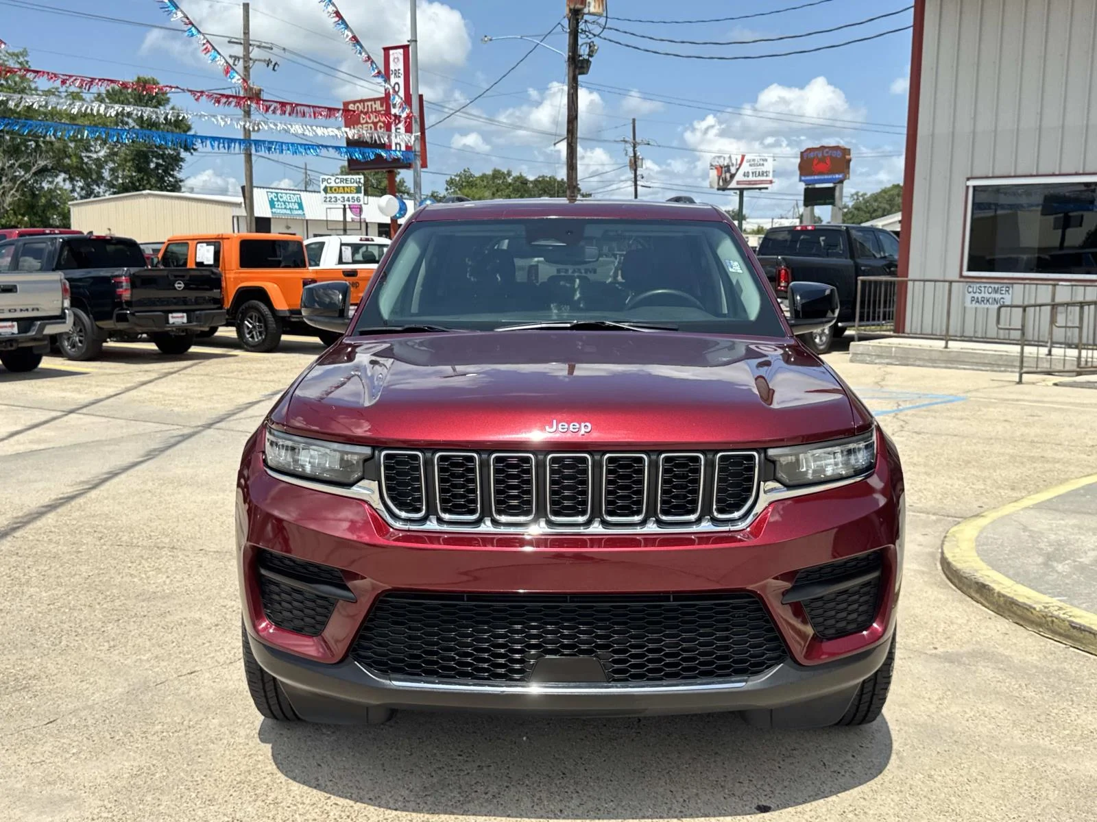 Used 2024 Velvet Red Pearlcoat Jeep Laredo image 2