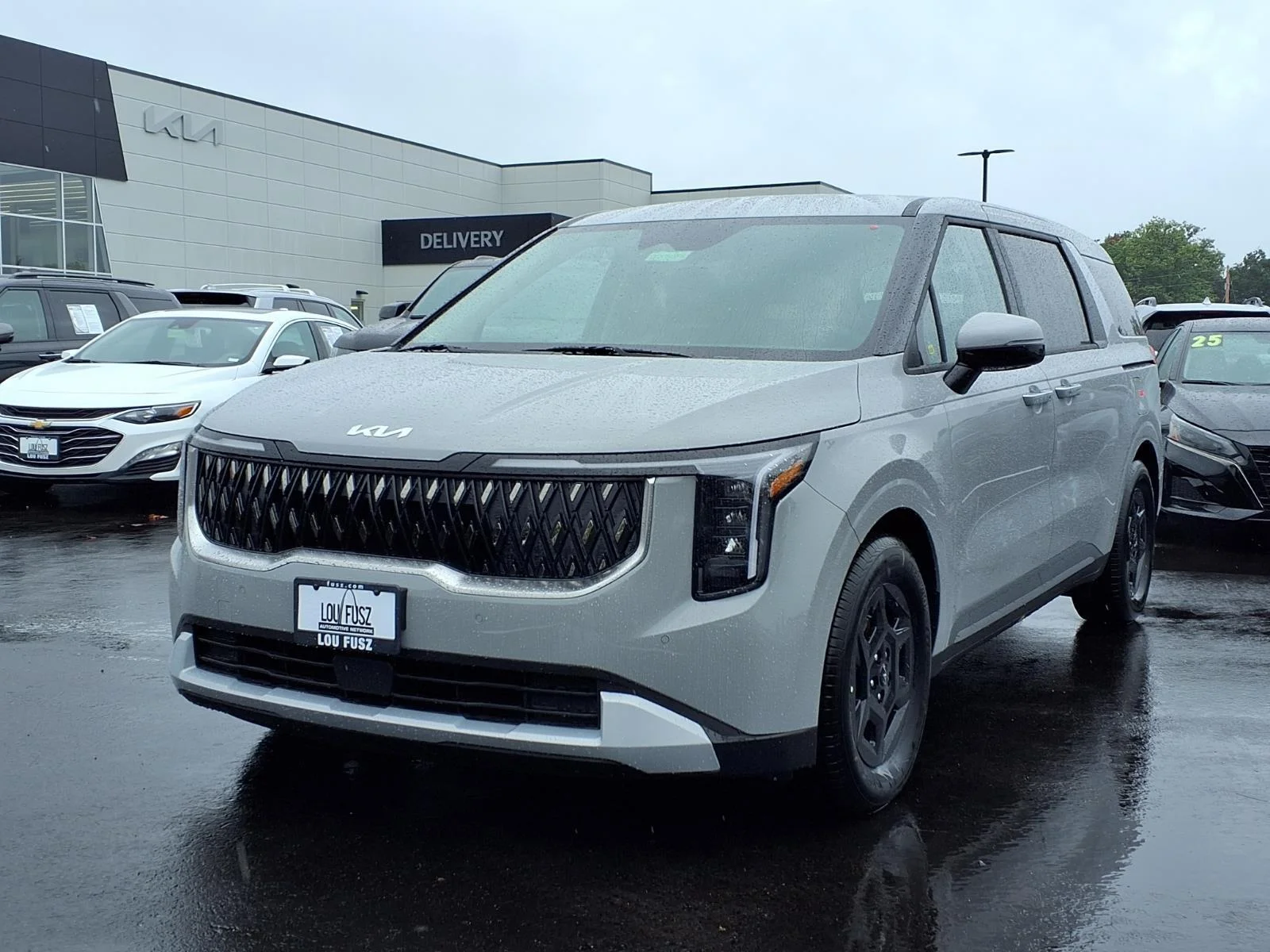 New 2027 Ceramic Silver Kia LXS image 1