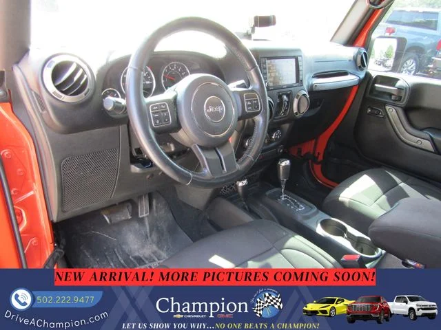Used 2015 Orange Jeep Unlimited Sport image 12