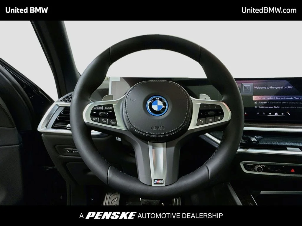 New 2026 Black Sapphire Metallic BMW xDrive50e image 6