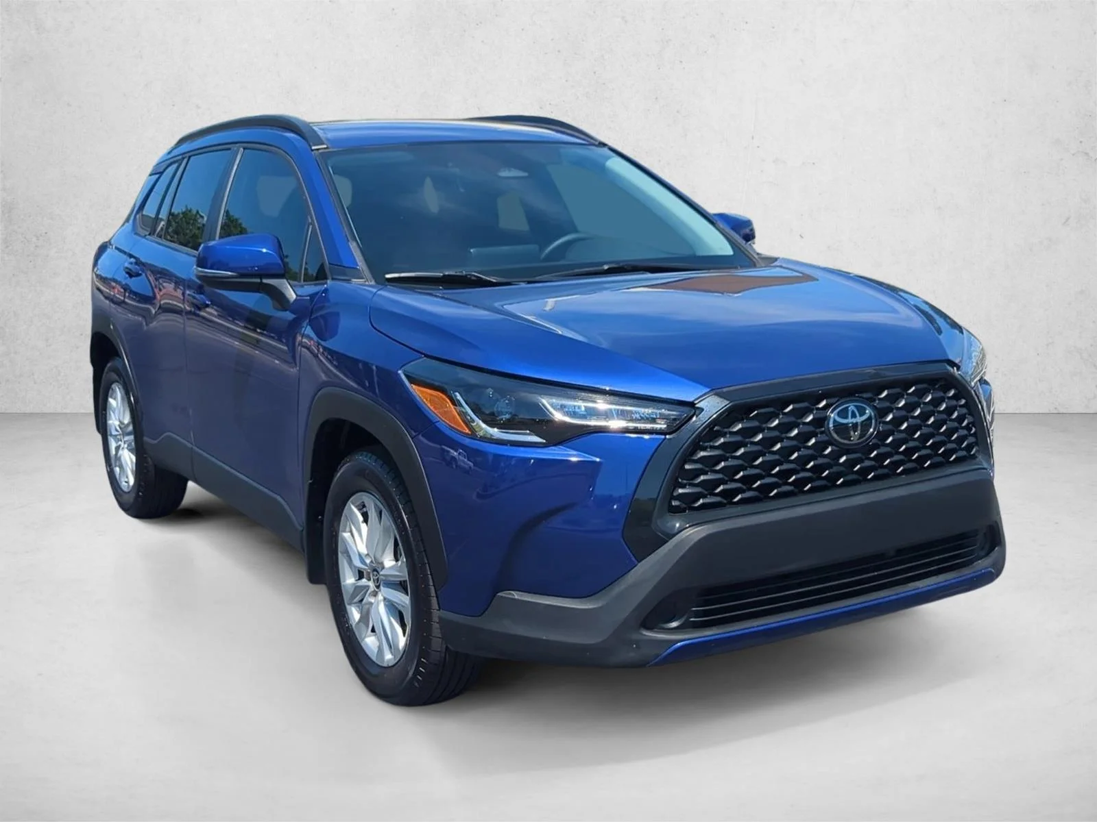 Used 2024 Blue Crush Metallic Toyota LE image 3