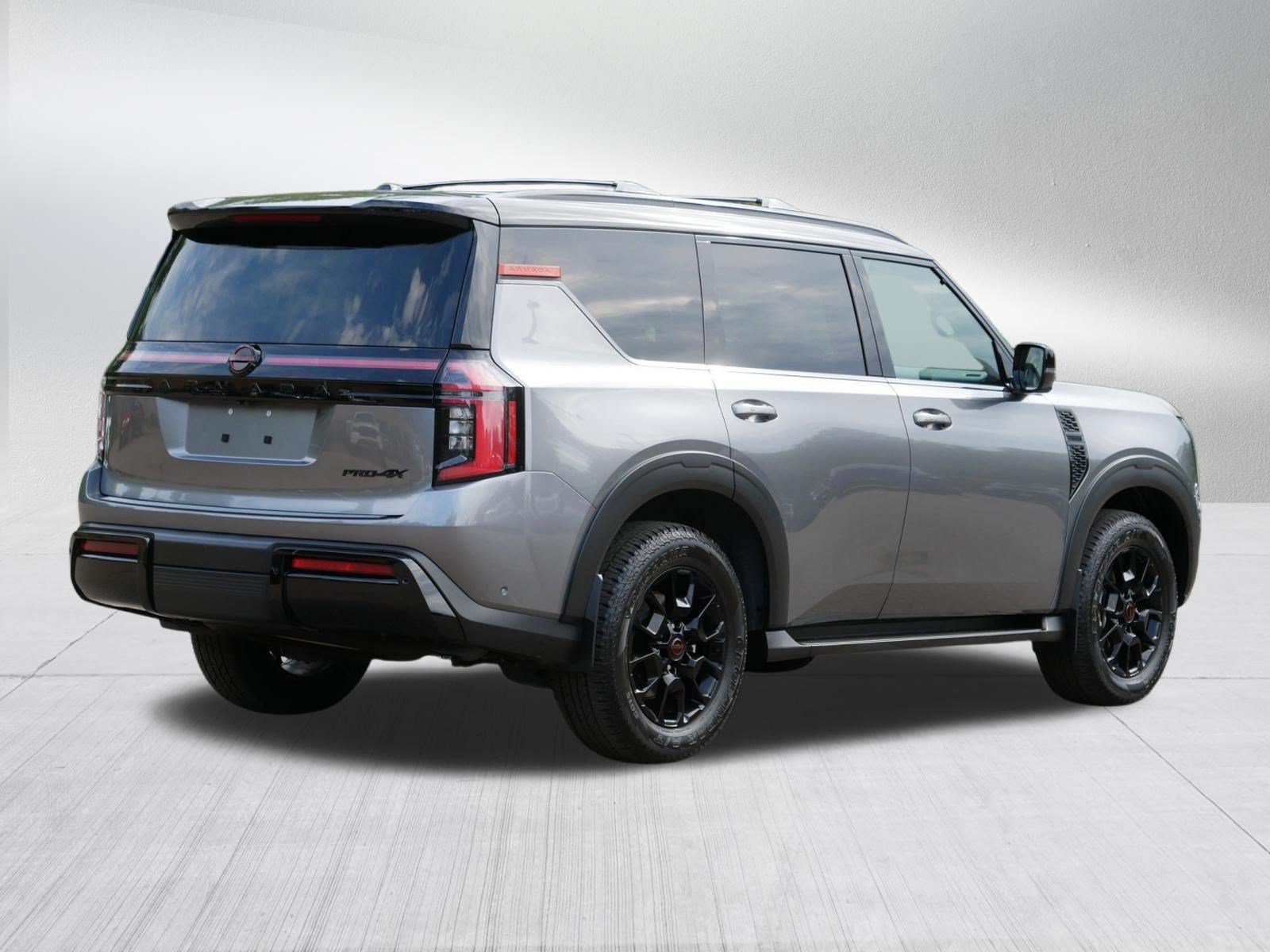 Used 2025 Gun Metallic/Super Black Nissan PRO-4X image 7