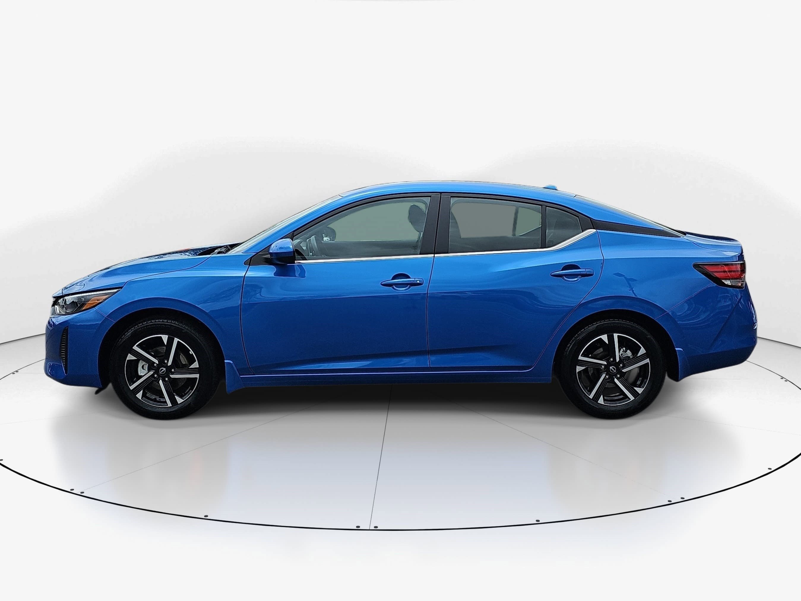 Used 2025 Electric Blue Metallic Nissan SV image 6
