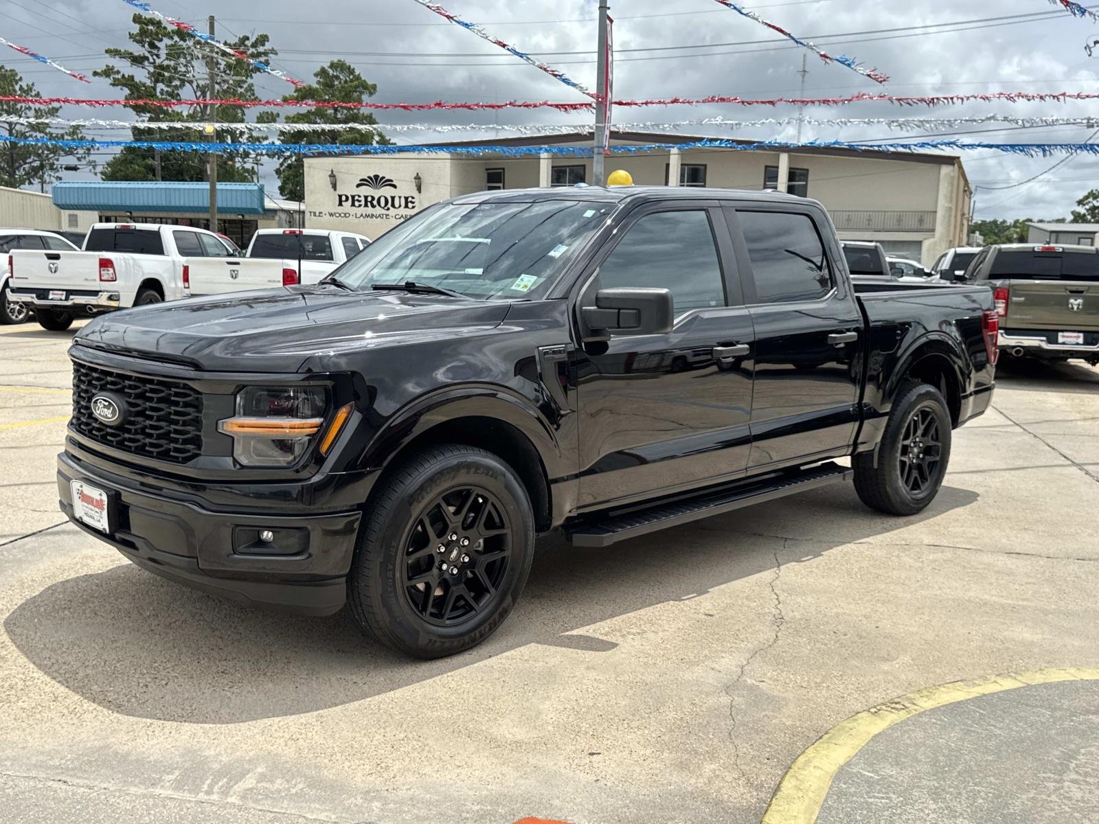 Used 2024 Agate Black Metallic Ford STX image 3