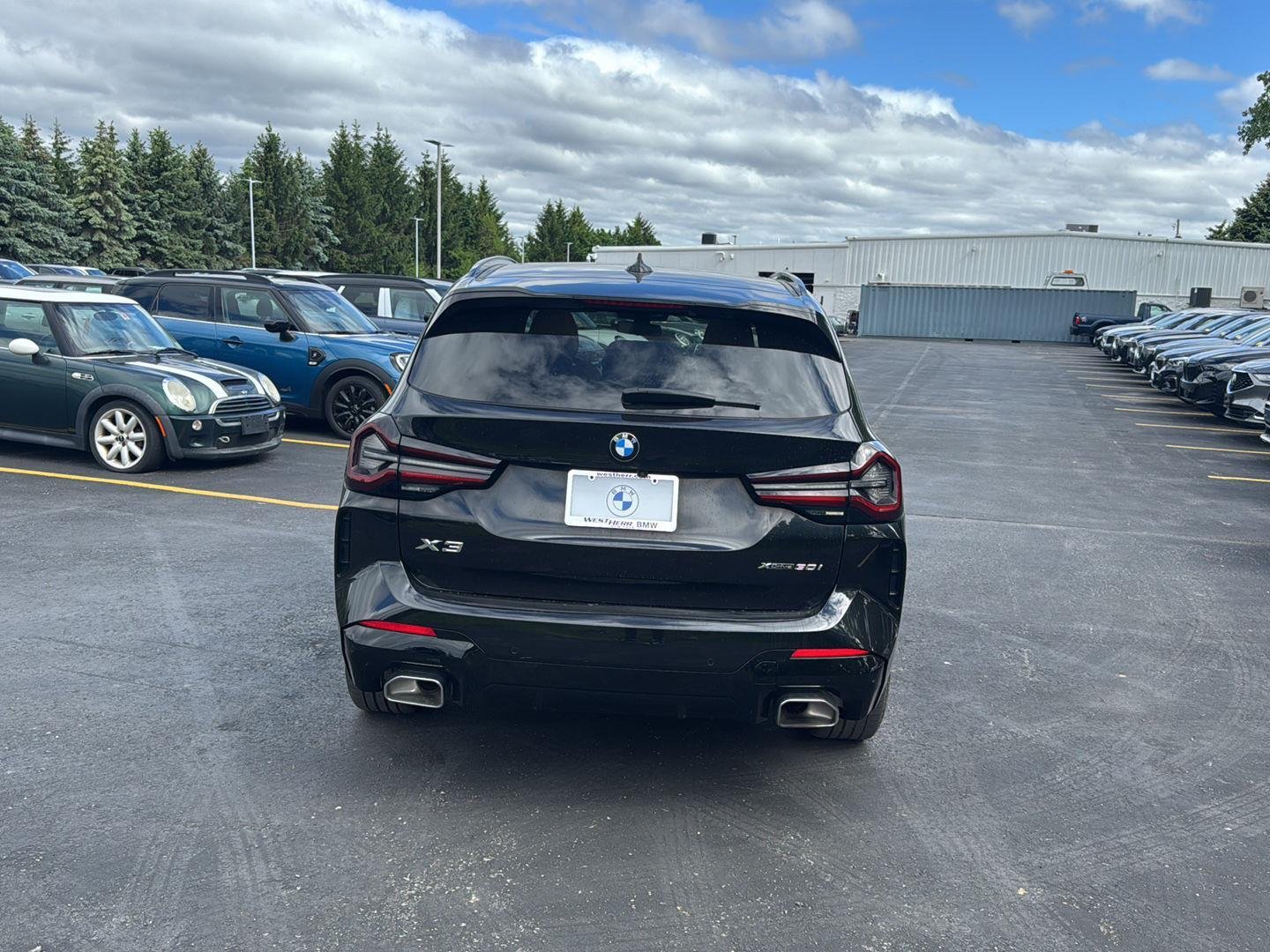 Used 2023 Black Sapphire Metallic BMW xDrive30i image 4