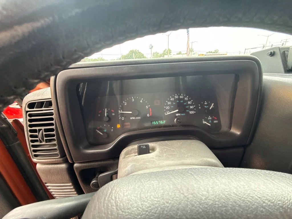 Used 2000 Orange Jeep Sport image 21