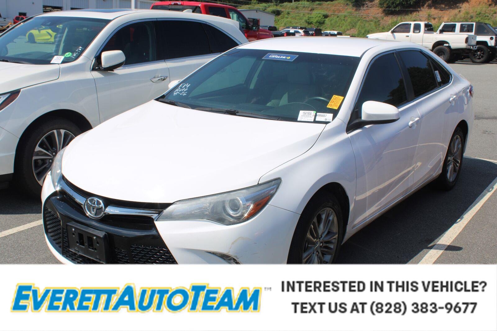 Used 2015 Super White Toyota LE image 1