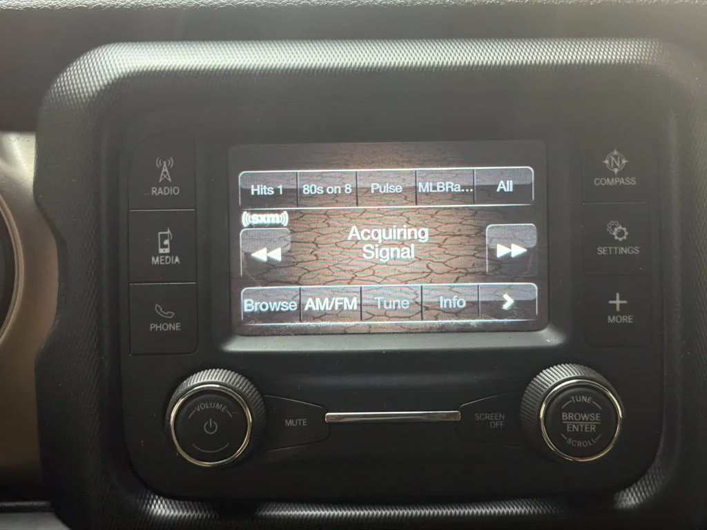 Used 2018 Black Clearcoat Jeep Unlimited Sport S image 14