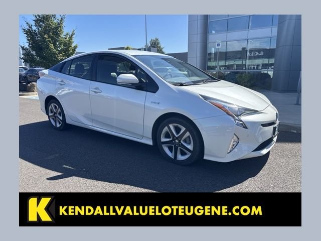 Used 2018 White Toyota Three Touring image 1