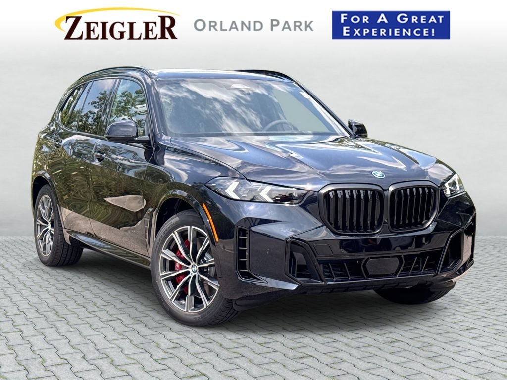 New 2026 Carbon Black Metallic BMW xDrive50e image 1