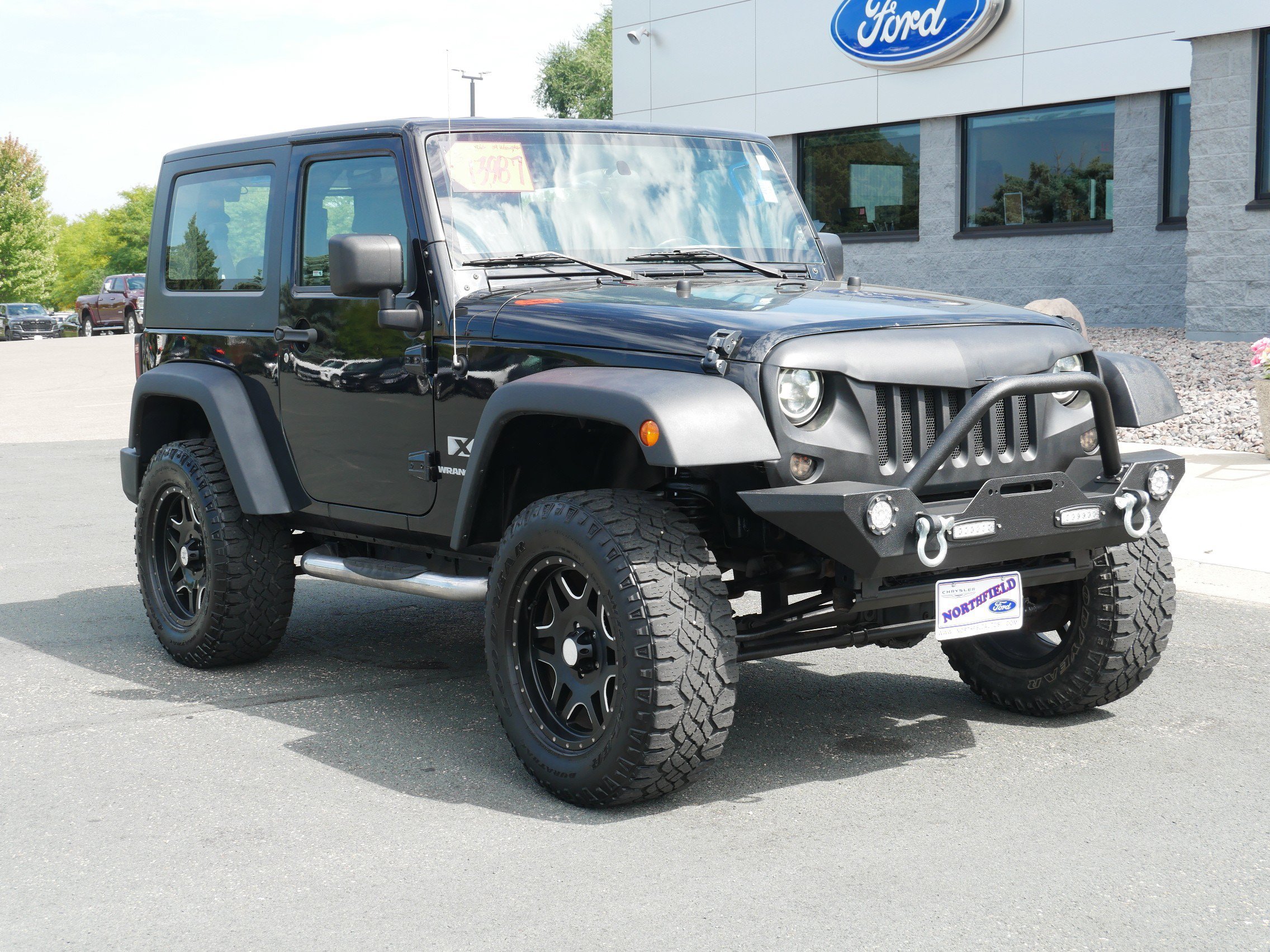 Used 2009 Jeep Wrangler X with VIN 1J4FA24149L720204 for sale in Northfield, Minnesota
