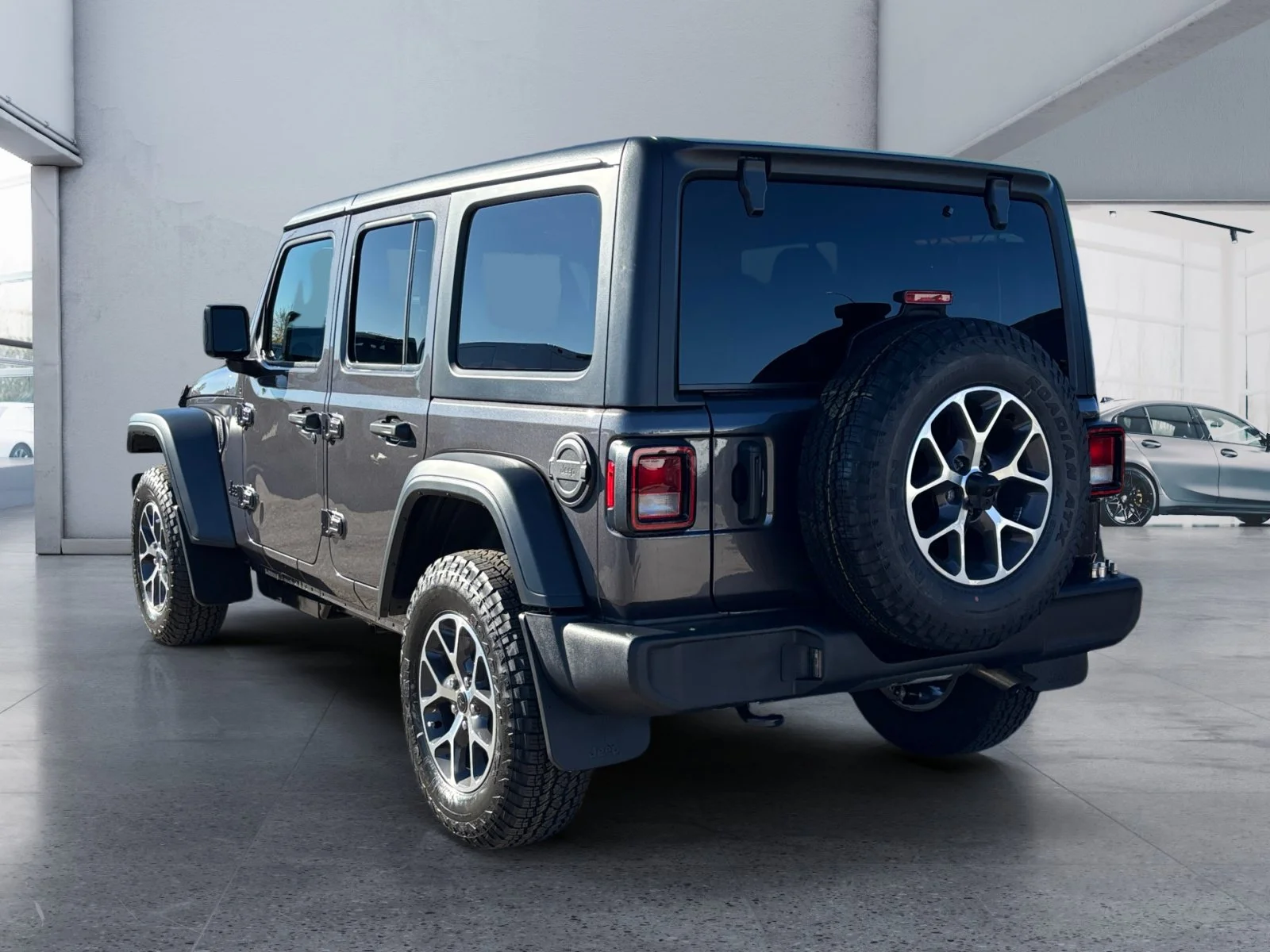 New 2027 Granite Crystal Metallic Jeep Sport S image 3