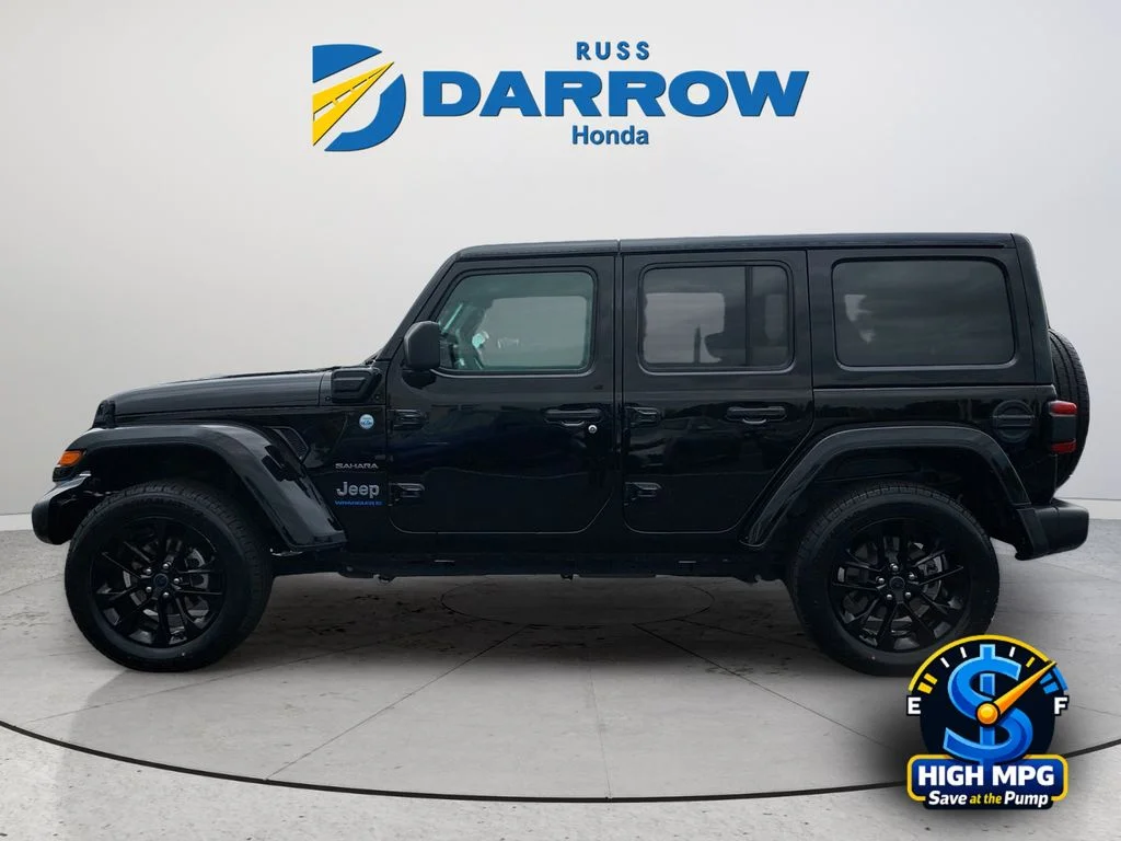 Used 2024 Black Jeep Sahara 4xe image 2