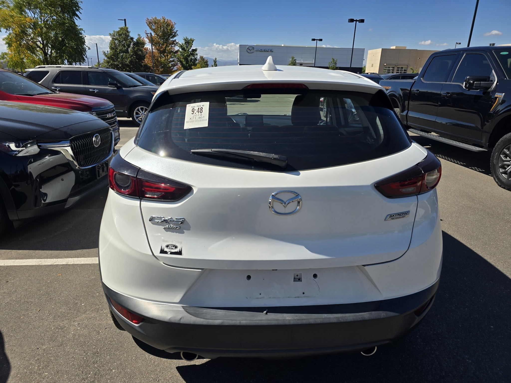 Used 2019 Snowflake White Pearl Mazda Touring image 4
