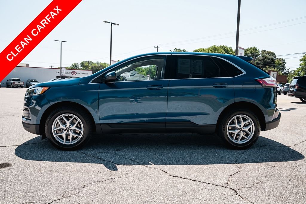 Used 2024 Blue Metallic Ford SEL image 4