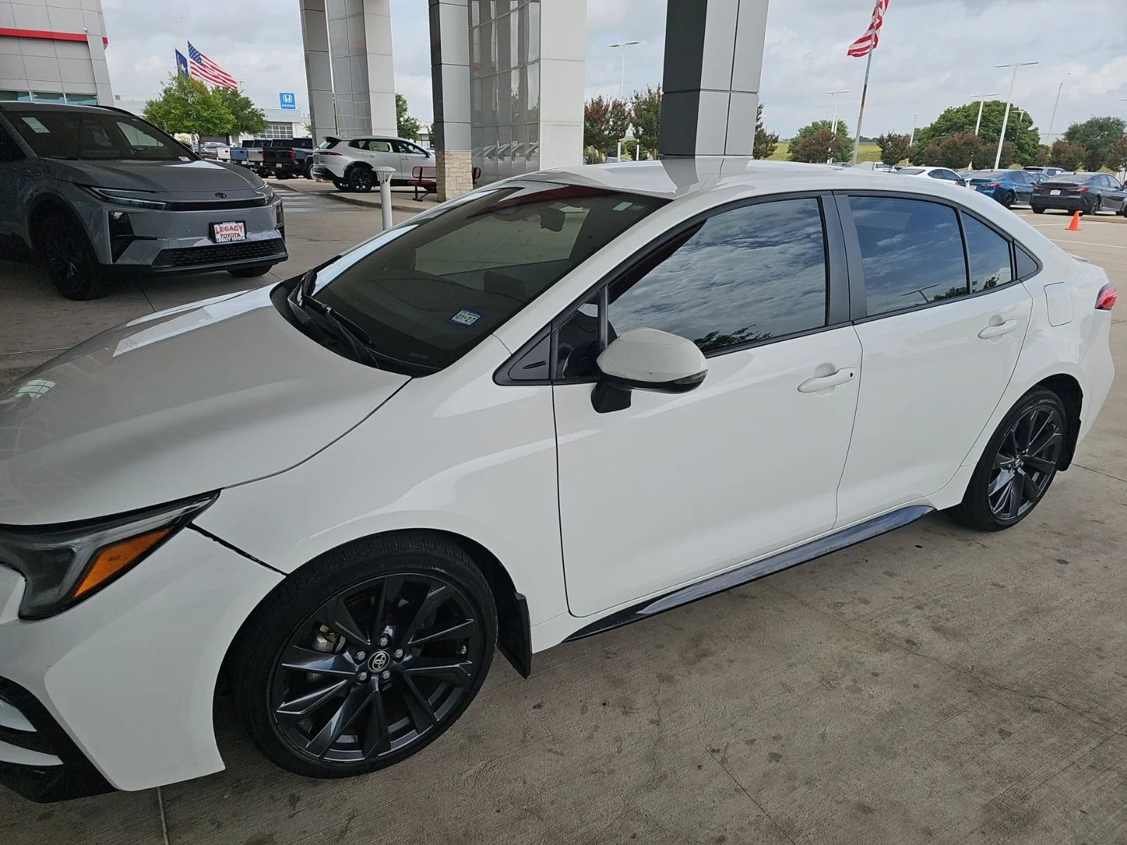 Used 2024 White Toyota SE image 1
