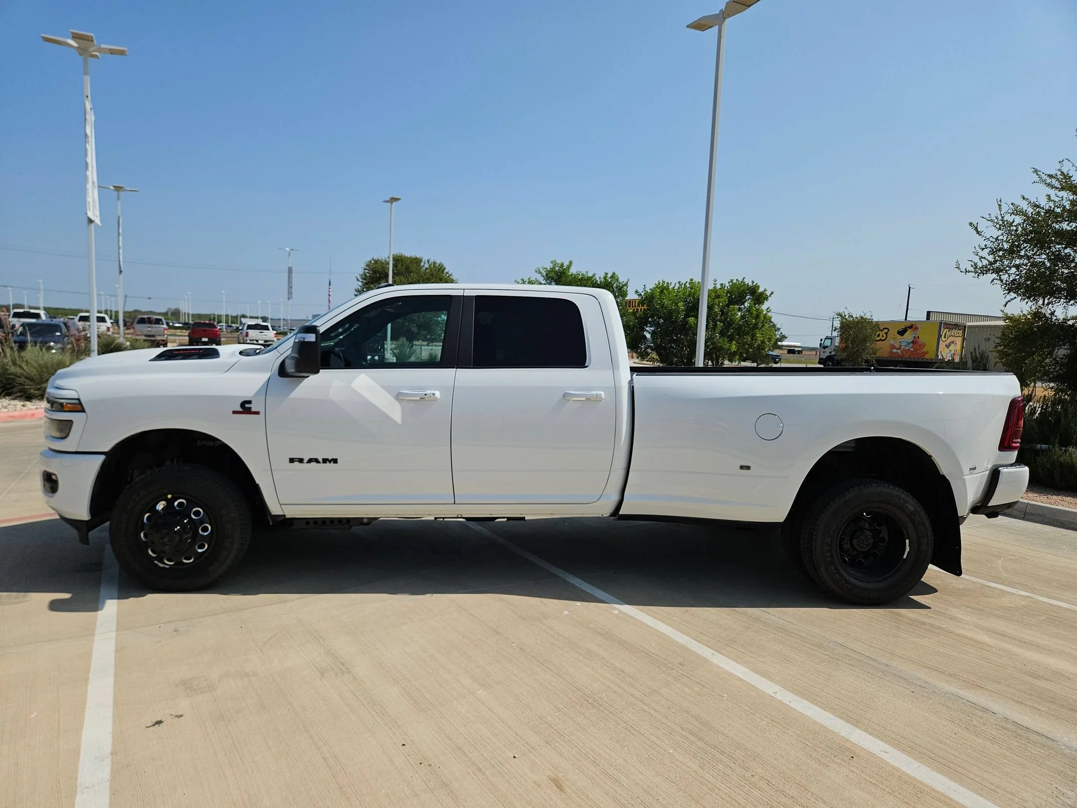 New 2026 Bright White Clear-Coat Exterior Paint RAM Laramie image 6