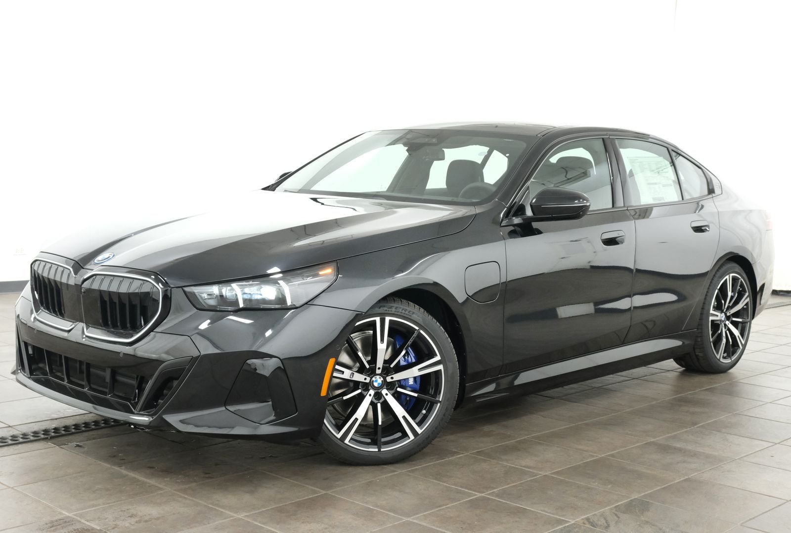 2027 BMW 5 Series 550e xDrive Sedan's photo