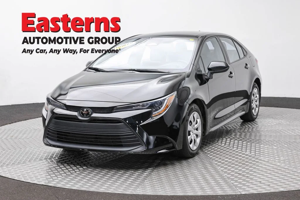 Used 2024 Black Toyota LE image 1