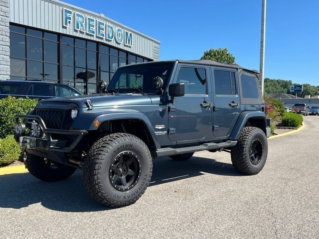 Used 2008 Steel Blue Metallic Jeep Unlimited Sahara image 1